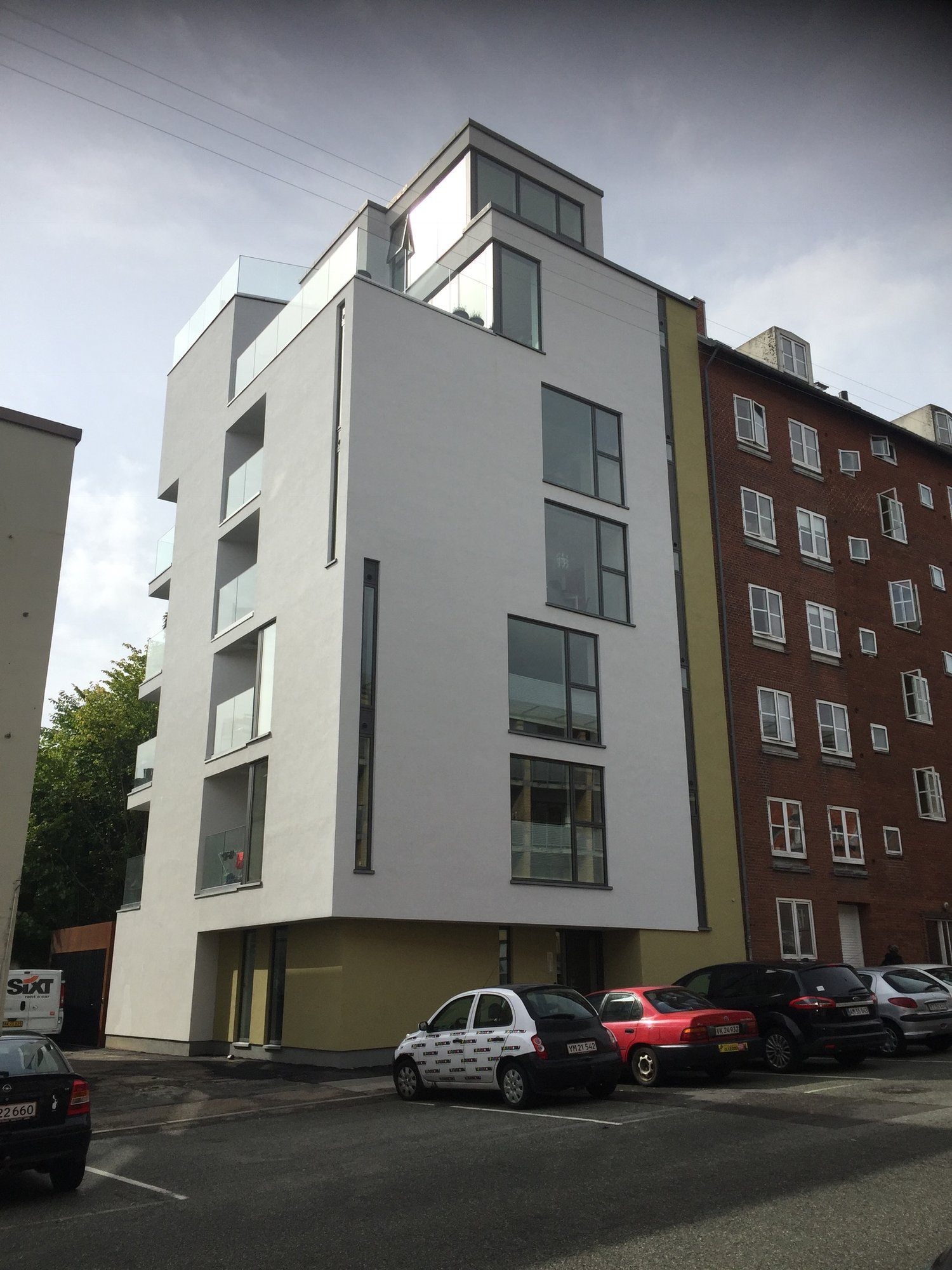 Etagebyggeri med facadepuds